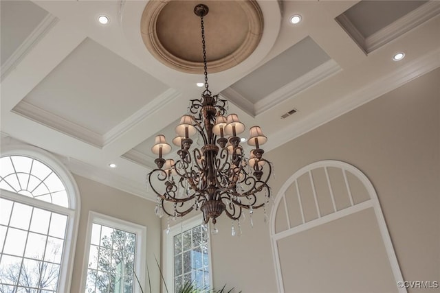 interior details featuring coffered ceiling, ornamental molding, beamed ceiling, and an inviting chandelier