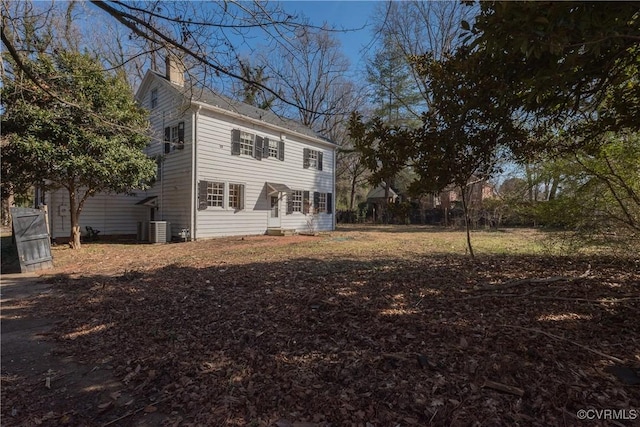 back of property featuring cooling unit