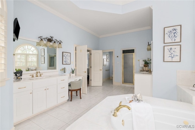 bathroom with crown molding, vanity, separate shower and tub, and tile patterned flooring