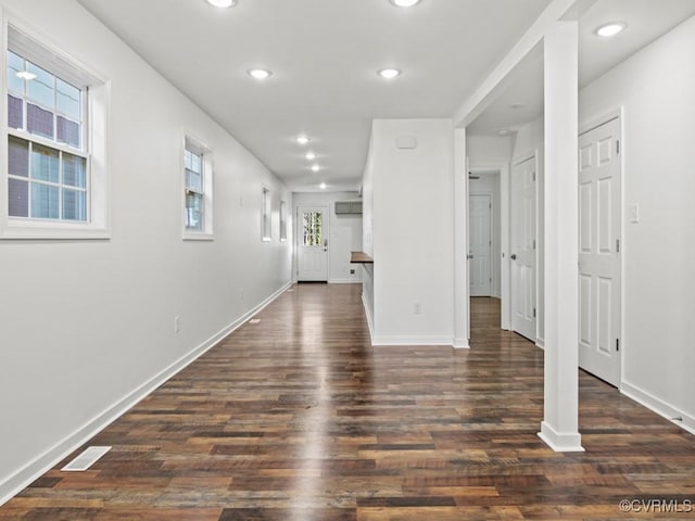 interior space with dark hardwood / wood-style flooring