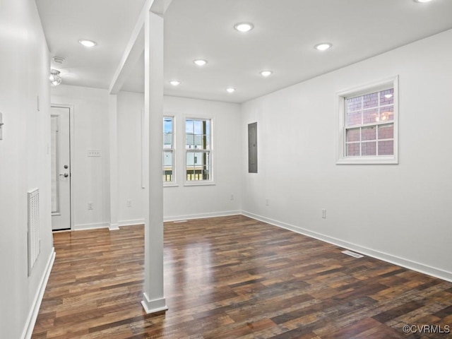 unfurnished room with dark hardwood / wood-style floors