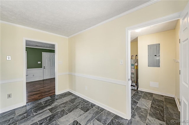 spare room featuring ornamental molding, electric panel, water heater, and a textured ceiling