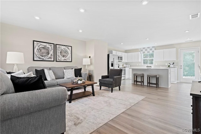 living room featuring light hardwood / wood-style flooring