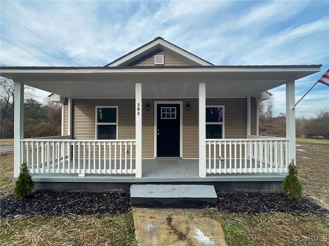 bungalow-style home featuring covered porch