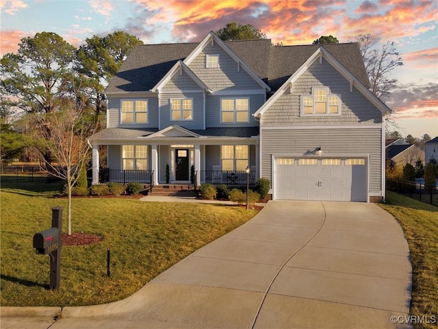 craftsman-style house with covered porch and a lawn