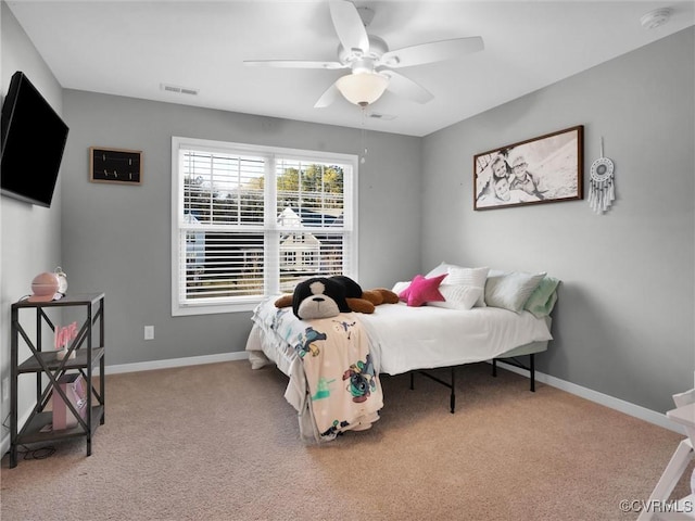 carpeted bedroom featuring ceiling fan