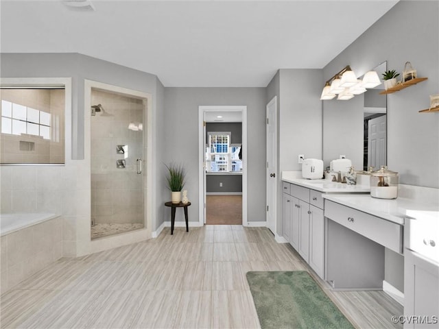 bathroom with vanity and plus walk in shower