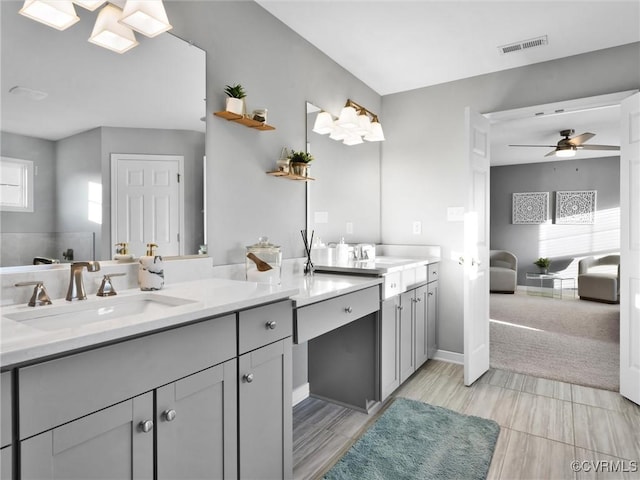 bathroom with vanity and ceiling fan