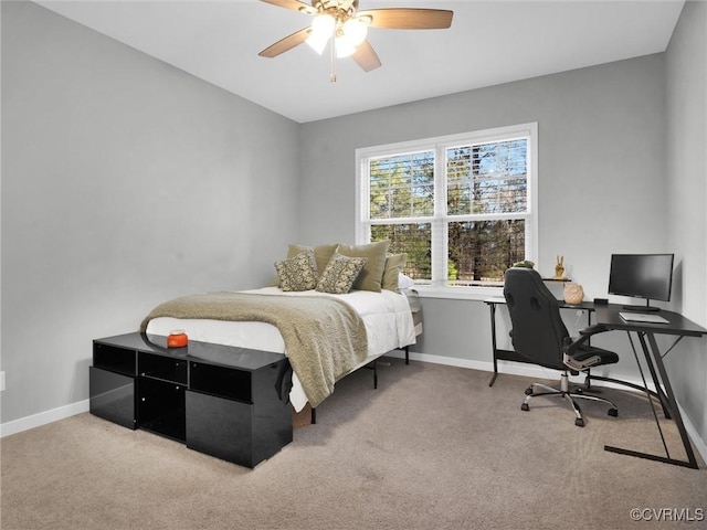 bedroom featuring ceiling fan and carpet floors