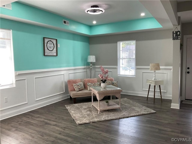 sitting room featuring dark hardwood / wood-style flooring