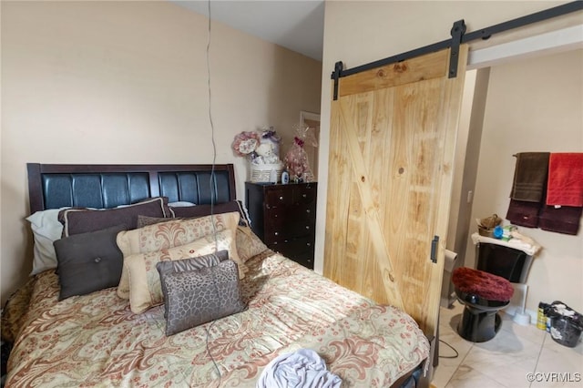 bedroom with a barn door