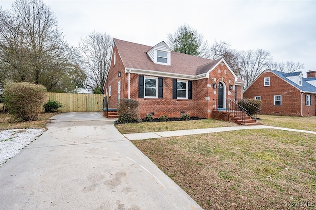 view of front of home with a front lawn