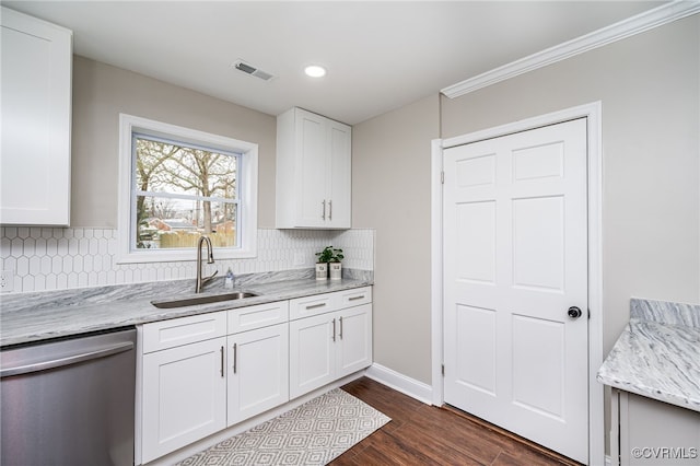 kitchen featuring white cabinetry, light stone countertops, sink, and stainless steel dishwasher