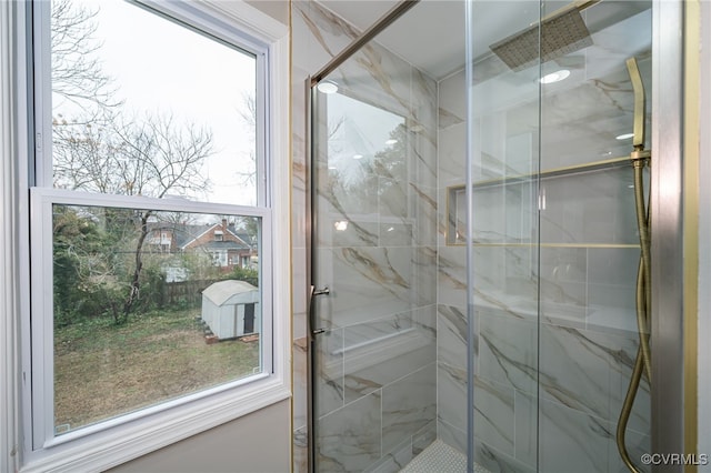 bathroom featuring an enclosed shower