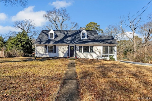 view of front of property with a front lawn