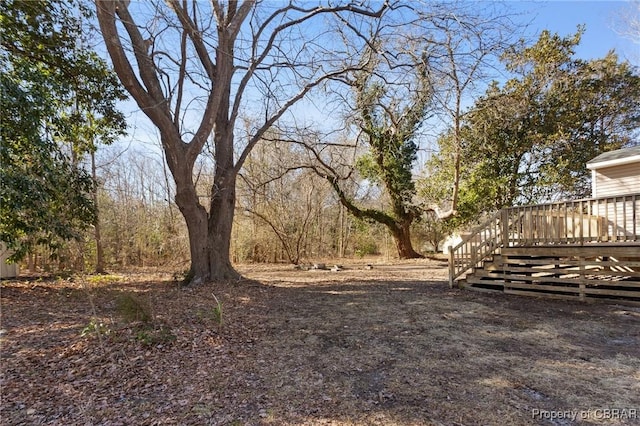 view of yard with a deck