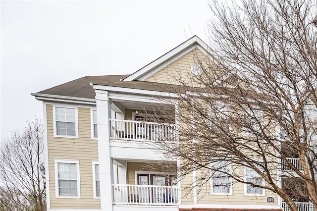 view of front of home with a balcony