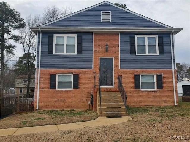 view of front of property with brick siding