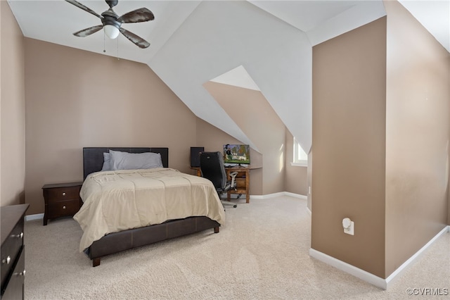 carpeted bedroom with lofted ceiling and ceiling fan