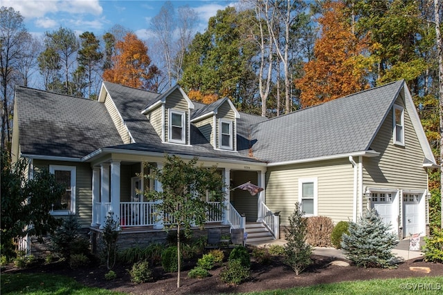 cape cod-style house with a porch