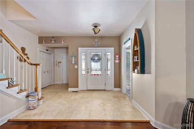 view of tiled foyer entrance