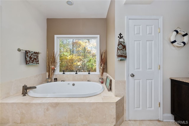 bathroom featuring tiled bath