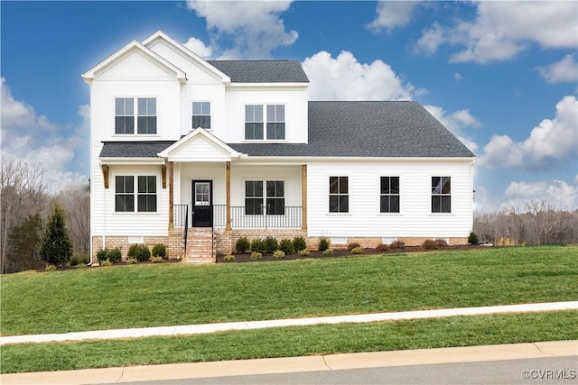 view of front facade featuring a porch and a front yard