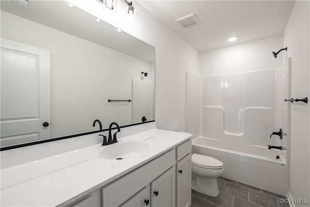 full bathroom with tile patterned flooring, vanity, shower / bathtub combination, and toilet