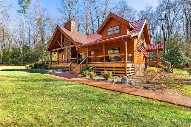 view of front of home featuring covered porch and a front yard