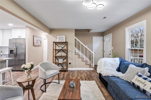 living room featuring dark hardwood / wood-style flooring