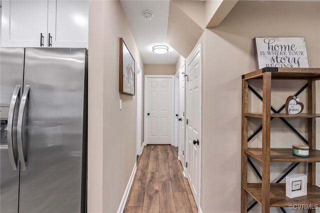 corridor with dark wood-type flooring