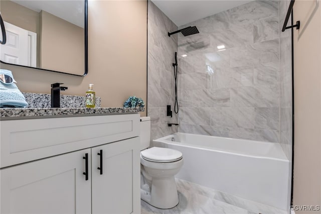 full bathroom with vanity, toilet, and tiled shower / bath combo