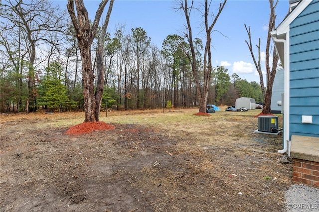 view of yard with central AC