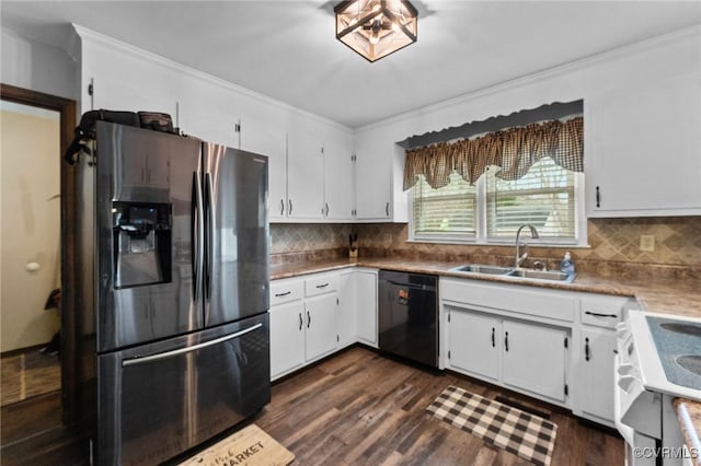 kitchen featuring sink, white cabinetry, crown molding, stainless steel fridge, and black dishwasher