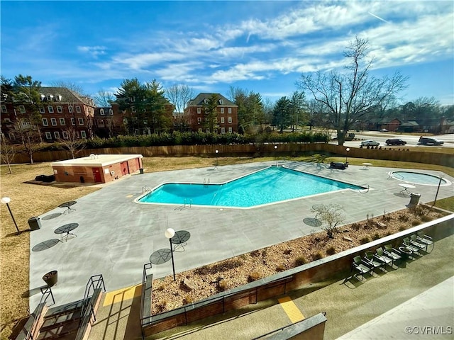 pool with a patio