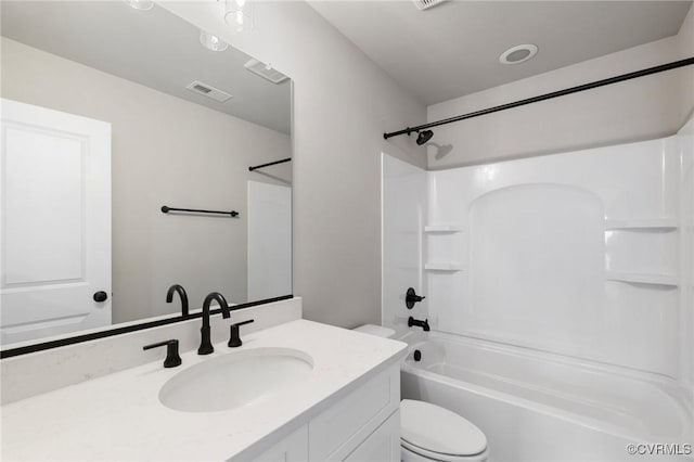 full bathroom with shower / washtub combination, toilet, and vanity