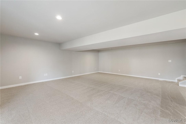 empty room with light colored carpet