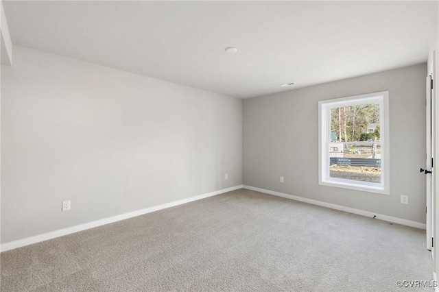 view of carpeted spare room