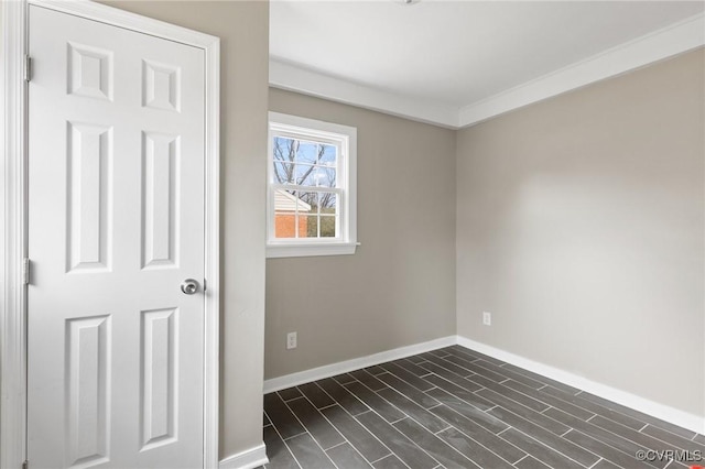 unfurnished room with dark hardwood / wood-style flooring