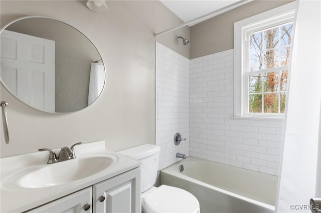 full bathroom featuring vanity, shower / bath combination with curtain, and toilet