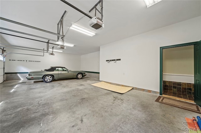 parking deck featuring a garage door opener