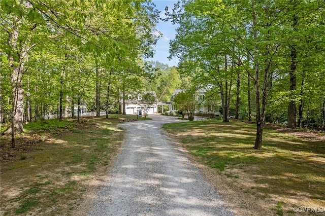 view of road featuring driveway