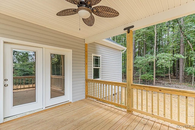 wooden deck with french doors and ceiling fan