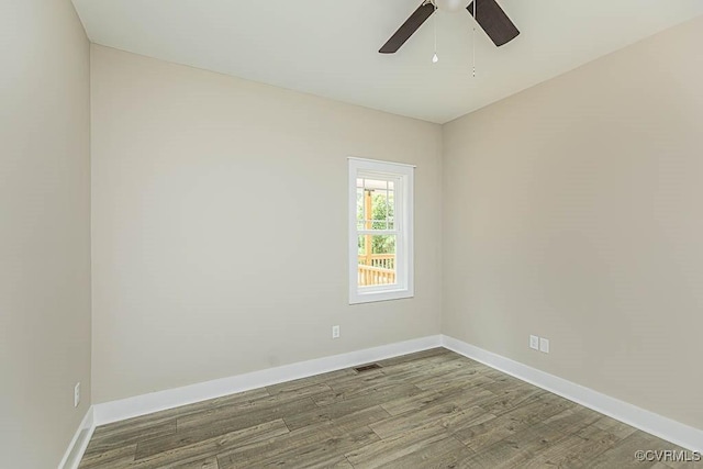 unfurnished room featuring hardwood / wood-style flooring and ceiling fan