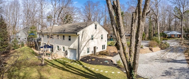 view of home's exterior with a lawn