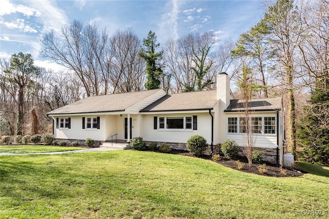 single story home featuring a front yard