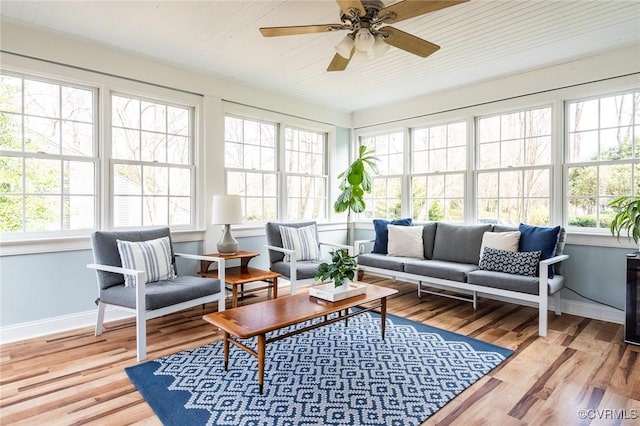 sunroom / solarium with ceiling fan