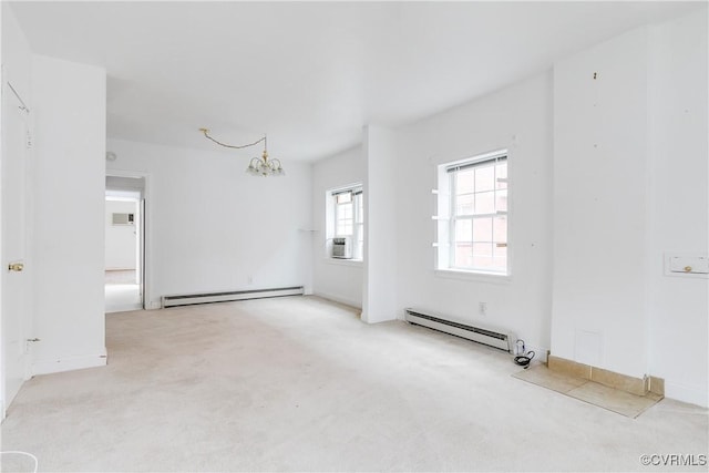 carpeted spare room featuring cooling unit, a baseboard heating unit, and a notable chandelier