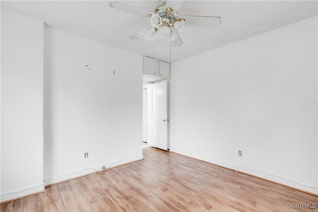 unfurnished room with ceiling fan and light hardwood / wood-style flooring