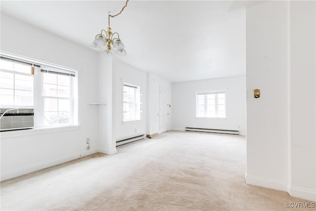 interior space featuring a baseboard heating unit, light colored carpet, an inviting chandelier, and cooling unit